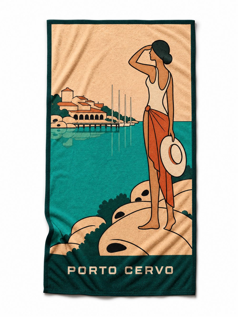 The PORTO CERVO beach towel laid flat on white